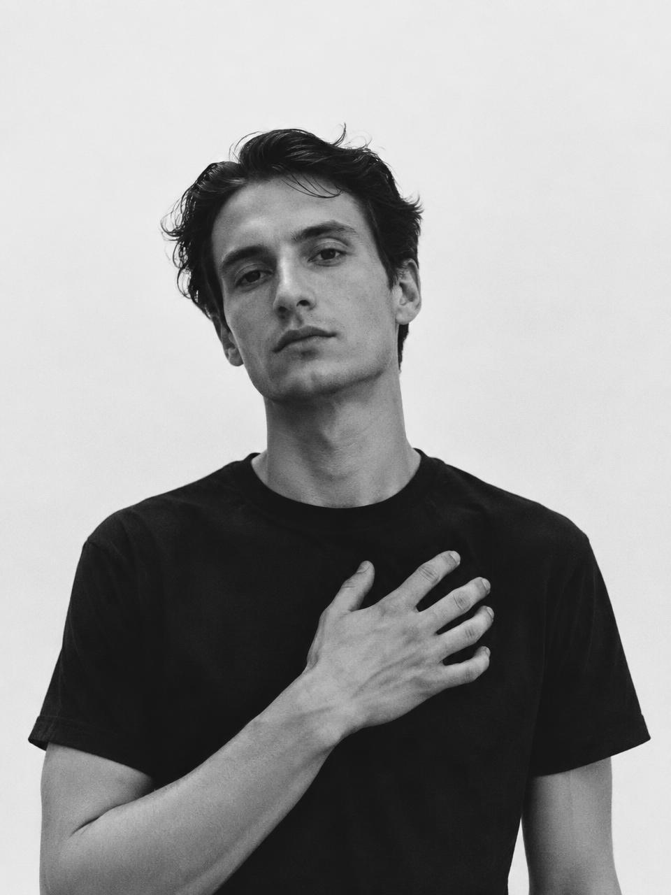 Hand over heart in the Oath Tee